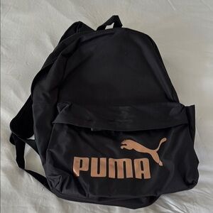 Puma Black Backpack with Durable Fabric and Classic Design